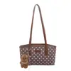 Bolso de mano elegante y versátil para mujer, nueva colección 2026, moderno y chic, adecuado para ir al trabajo, bolso de hombro, diseño de lunares, se puede llevar debajo del brazo