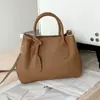 Bolso de Mano de Cuero Genuino para Mujer Bolso Cruzado Simple para el Trabajo Bolso de Hombro Único de Gama Alta Bolsos Tote Nuevos 2026