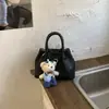 Bolso de Mano Retro de Gran Capacidad para Mujer Bolso 2026 Primavera Nuevo Estilo Bolso Cubo Simple de Hombro Cruzado Bolso de Viaje