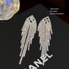Aretes geométricos de temperamento de diamantes completos súper brillantes, aretes de borla larga exagerados de personalidad, aretes exquisitos de alta gama para otoño e invierno para mujer