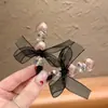 2026 Nuevo Estilo Pinza de Pato de Malla con Lazo de Corazón de Pedrería Pinza para Flequillo Lateral Pinza para el Cabello Versátil de Moda para el Uso Diario