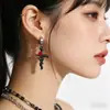 Artículo más vendido transfronterizo: Aretes de Alas de Diablo Estilo Gótico, Pinzas para Orejas de Acero Inoxidable con Espada y Corazón de Rosa, Accesorios para Orejas de Chica Picante