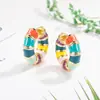 Pendientes de arcoíris de alta gama para mujer, diseño de nicho, argollas, ear cuffs, pendientes de botón exquisitos y elegantes, pendientes de lujo ligero de otoño e invierno