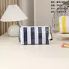 Bolsa de Maquillaje Rayada de PVC Modelo Nuevo 2026 Transfronteriza Bolsa de Almacenamiento Cosmético de Gran Capacidad Bolsa de Maquillaje de Viaje con Bloques de Color