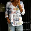 Nova camisa feminina de manga comprida com botões e gola V estampada transfronteiriça, elegante e estilosa para o trabalho, top casual único e moderno