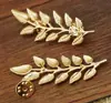Broche de hoja de oro y plata popular exquisito de alta calidad para hombres y mujeres pin de solapa para camisa suéter broche de hoja venta al por mayor