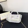 Nueva bolsa para niños bolsa de niña cadena de perlas bolso de mano moda estilo extranjero princesa hombro bandolera monedero