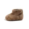 Botas peludas de estilo coreano para niñas, botas de nieve cálidas de invierno 2026 para niños, botines de forro polar de nicho, botas de algodón de color liso para bebé