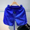 Shorts de Algodão e Linho Elásticos de Verão Masculinos Shorts Quatro Quartos para Praia Estudante da Moda Cor Sólida Largos de Cintura Baixa