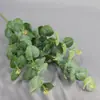 Flor de simulación de alta gama planta de simulación decoración del hogar hoja de dinero eucalipto flor artificial hojas artificiales planta verde venta al por mayor