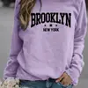 Sudadera Holgada de Cuello Redondo para Mujer - Patrón de Estrella Brooklyn Nueva York Estampado, Beige Claro con Negro, Suave