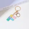 Llavero de Resina Color Arcoíris Letra Inglesa Borla Colgante Creativo Alto Sentido Gota de Pegamento de Cristal Colgante de Bolso
