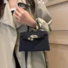 2025 Nuevo Bolso Kelly de Moda Estilo Ins Chica Viajera Versión Coreana Bolso de Hombro Bolso de Mano Versátil a la Moda Bolso Cruzado