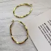 Aretes Ovalados Obi Yabi Diámetro 2.6cm Aretes de Nicho de Moda Aretes de Estilo Frío Elegantes y Exquisitos