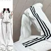 Pantalones Deportivos Casuales de Patchwork a Rayas Estilo Americano para Mujer Temporada Otoño Invierno Nuevos Pantalones Largos Deportivos Rectos Sueltos Adelgazantes de Pierna Ancha