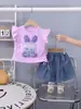 Conjunto de Dos Piezas de Nuevo Estilo Veraniego para Niñas: Camisetas de Manga Corta y Shorts de Mezclilla con Lindo Estampado de Conejo para el Verano de los Niños