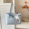 El bolso popular de estilo dulce para mujer de este año es el nuevo modelo de verano 2026 con adornos de estrellas, bolso de hombro moderno y bolso de axila