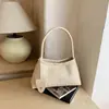Bolsa de axila com textura tramada cruzada para mulheres 2026 nova bolsa baguette estilosa de ombro único bolsa tote texturizada de mão para mulheres