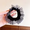 Goma para el pelo de malla a cuadros negros Goma para el pelo de encaje dulce Anillo de intestino delgado versátil y moderno Banda de goma de alta elasticidad