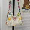 La bolsa tejida súper popular del verano para mujer, nuevo modelo 2026, estilo artístico, bolsa de playa tejida para vacaciones, bolso de hombro y cruzado