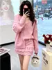 Conjunto de cárdigan de punto rosa dulce y juvenil estilo francés y falda para mujer, otoño e invierno, diseño elegante, conjunto de dos piezas que estiliza