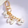 Nuevo Llavero Creativo de Lazo Colorido Colgante de Gota de Aceite para Bolso Coche Llavero Lindo Accesorio para Auriculares
