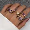 Anillo Cruzado Europeo y Americano con Gema Morada para Mujer, Anillo de Lujo Ligero de Alta Gama Incrustado con Diamantes de Sol y Luna