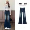 Jeans acampanados de tiro alto nuevos 2026 transfronterizos, pantalones vaqueros lavados con efecto desgastado estilo retro americano para mujer, estilo de chica popular ajustado para otoño