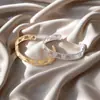 Moda Europeia e Americana Pulseira de Metal Aço Titânio para Mulheres com Design Geométrico Diamante Fivela de Mola Pulseira Recortada Série de Emendas Multicamadas