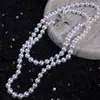 Moda nueva de primavera y verano elegante francesa un collar largo de perlas Shijia de uso múltiple hebilla de lazo hija vintage