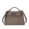 Otoño 2026 Nueva Moda Simple Oficina Viaje Bolso Cuadrado Pequeño Estilo Coreano Nicho Chic Bolso de Mano Bolso de Hombro Mujer