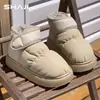 Otoño e invierno Nuevas botas de nieve de tela de plumón cálidas antideslizantes con plataforma botas de nieve forradas de vellón para uso en interiores y exteriores zapatos de pan a la moda