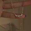 Novo colar de diamante com rosto sorridente para mulheres, corrente leve de clavícula de luxo, design de nicho, versátil para o dia a dia, simples, estiloso e sofisticado