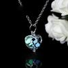 Puesto de venta de joyas, colgante de corazón hueco luminoso, collar de perlas luminosas, piedra fluorescente, suministro al por mayor de piedra luminosa
