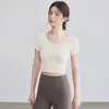 Hermoso Top de Yoga Espalda Descubierta para Mujer 2026 Nuevo Transpirable Ropa de Fitness Traje Deportivo de Pilates Manga Corta con Almohadillas en el Pecho