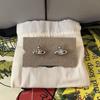Pendientes clásicos de Saturno con circonitas mini, pendientes exquisitos de nicho para mujer, nuevos pendientes de estilo frío y avanzados.