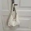 Nova bolsa de ombro de tricô texturizado com cordão, casual e versátil, adequada para o dia a dia, bolsa tote de grande capacidade com estampa floral para mulheres