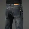 Jeans retro de alta gama para hombre, pantalones rectos de corte ajustado, pantalones versátiles elásticos de marca de moda, nuevo modelo primavera 2026