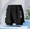 Bañadores de hombre de doble capa y corte holgado para comercio electrónico transfronterizo, anti-vergüenza, transpirables, de secado rápido, adecuados para correr, deportes y baños en aguas termales