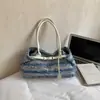 Bolso de mezclilla para mujer, nuevo de 2026, moda casual de primavera, bolso de hombro versátil, bolso tote de gran capacidad para el día a día