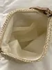 Bolso de Estilo Étnico Bohemio Transfronterizo para Mujer 2026 Nuevo Bolso Tejido Hueco para Teléfono Móvil Bolso de Playa para Vacaciones en la Costa