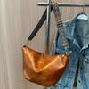 Bolsa Feminina de Grande Capacidade Outono/Inverno 2026 Novo Modelo Textura de Alta Qualidade Bolsa de Ombro Transversal com Alça Larga Popular Bolsa Saco Balde Bolinho