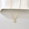 L235 Cadena de Cuentas Redondas de Moda al por Mayor Cadena para Clavícula con Colgante de Zircón Blanco Color Dorado Joyería Simple Europea y Americana