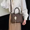 Bolsa de luxo de alta qualidade 2026 nova moda versátil para o dia a dia, de ombro e transversal para passeios