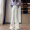 Pantalones casuales de retazos estilo francés para mujer, con un diseño elegante, pantalones microacampanados con flecos, pantalones de punto de pierna ancha fluidos, pantalones de pierna recta A13935