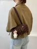 Nova bolsa bowling de bolinhas outono/inverno 2026, bolsa tote estilosa e moderna, bolsa de ombro e bolsa de axila para trabalho e deslocamento