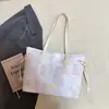 Bolsa Cesta de Verduras de Mano 2026 Nuevo Estilo Primavera Bolso Cubo Casual y Elegante con Textura de Moda y Colores Contrastantes, Bolso de Hombro