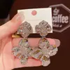Brincos de Flor Brilhante Metálico Prata Agulha Estilo Minimalista Personalidade Temperamento Brincos de Tarraxa Nicho Brincos de Alta Qualidade para Mulheres