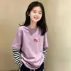 Camiseta de manga larga de dibujos animados para niña, prenda interior de otoño, nuevo modelo 2026, camiseta básica de algodón puro de dos piezas simuladas para niños talla mediana y grande
