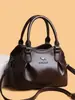 Bolso de Mano de Cuero Suave de Gama Alta 2026 Nueva Moda Tendencia Versátil Bolso de Hombro Gran Capacidad Bolso Cruzado Bolso para Mamá